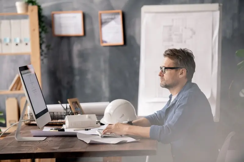 Mature competent engineer in casualwear looking at 2025 03 15 15 26 44 utc