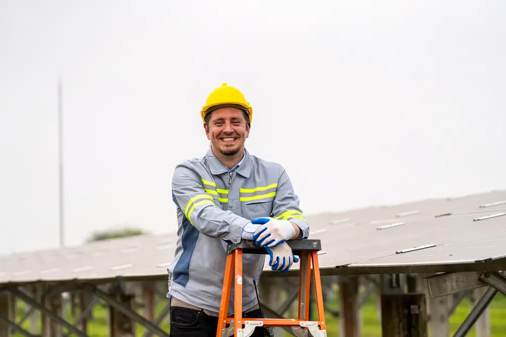 Roofing contractor in safety gear holding tools for roofing marketing vancouver services.